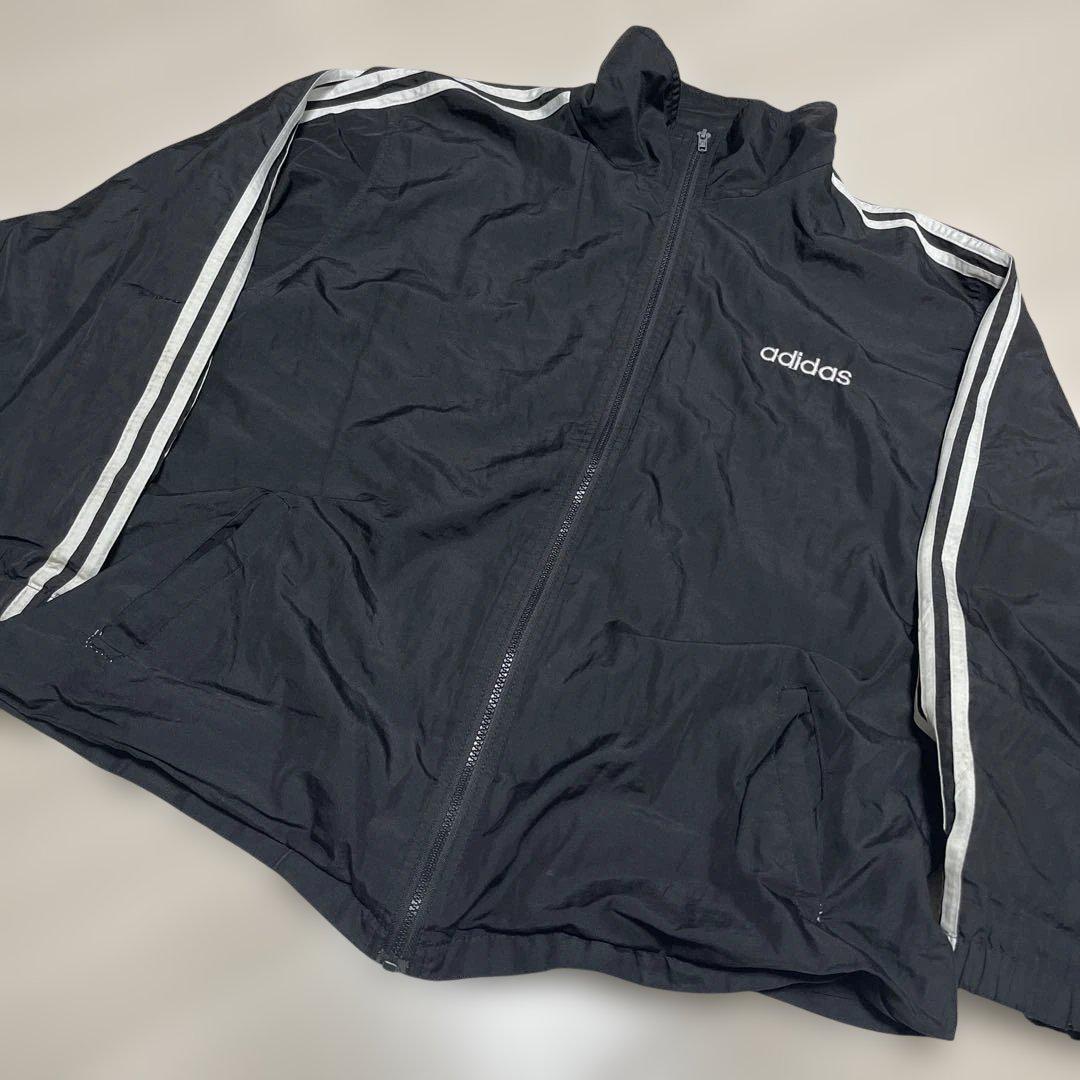 Used adidas 黒 ジップアップ ナイロンジャケットM-L程度拍卖