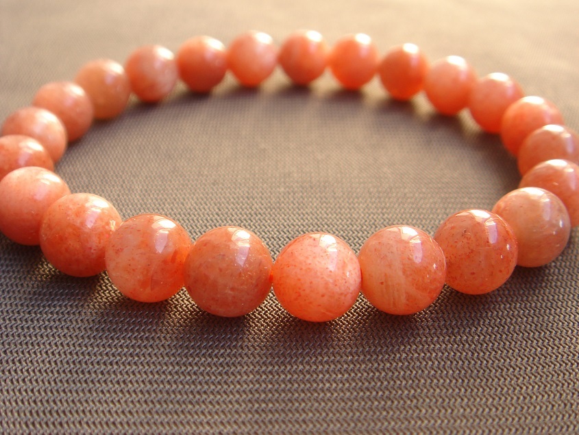 ☆キラキラ天然6A級サンストーン太陽石ブレスレット8mmA5拍卖