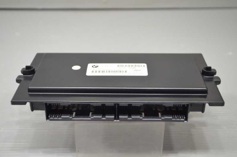 BMW 320i E90 右ハンドル 前期(VA20) 純正 破損無 取付OK 動作保証 フットウェルモジュール 437FT1115-09 k092401拍卖