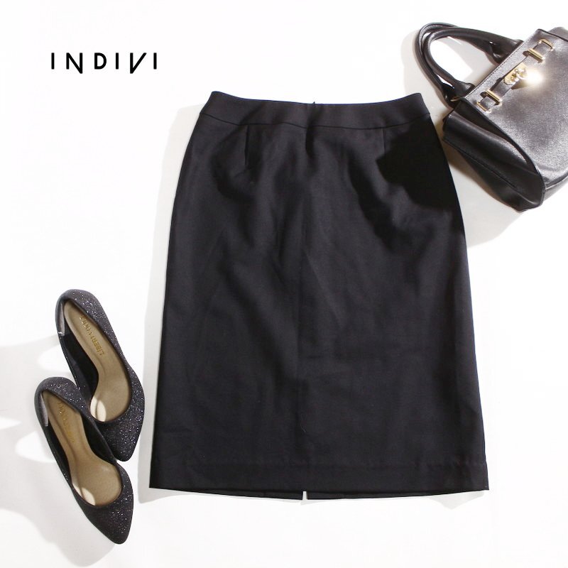 美品 インディヴィ INDIVI 株) ワールド 毛100% スーツ生地 タイトスカート 9号 38 ブラック 黒 オフィス 通勤 フォーマル ひざ丈スカート拍卖