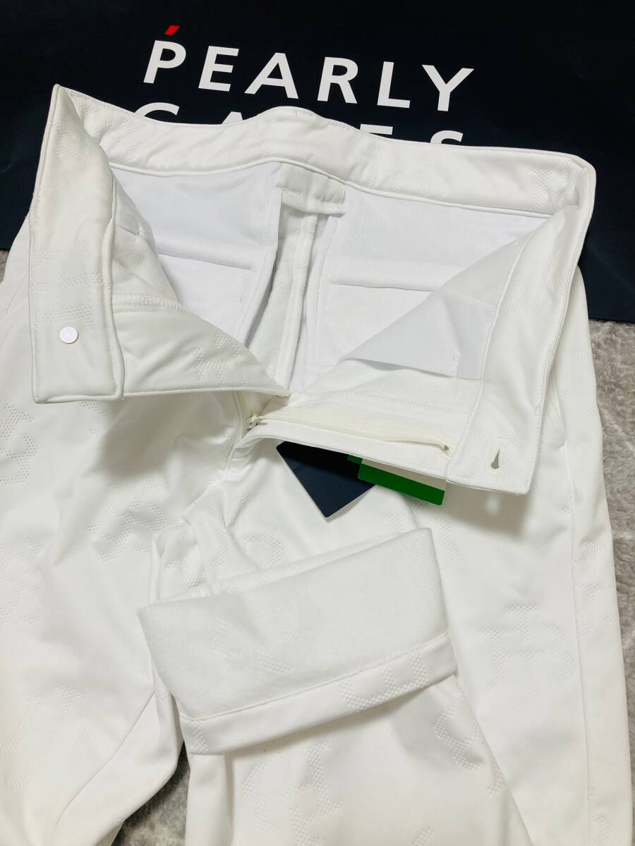 新品 パーリーゲイツ ジャックバニー WIND BLOCK ピンソニック裏フリース 防風テーパードパンツ(6)サイズLL/白 PEARLY GATES JACK BUNNY拍卖