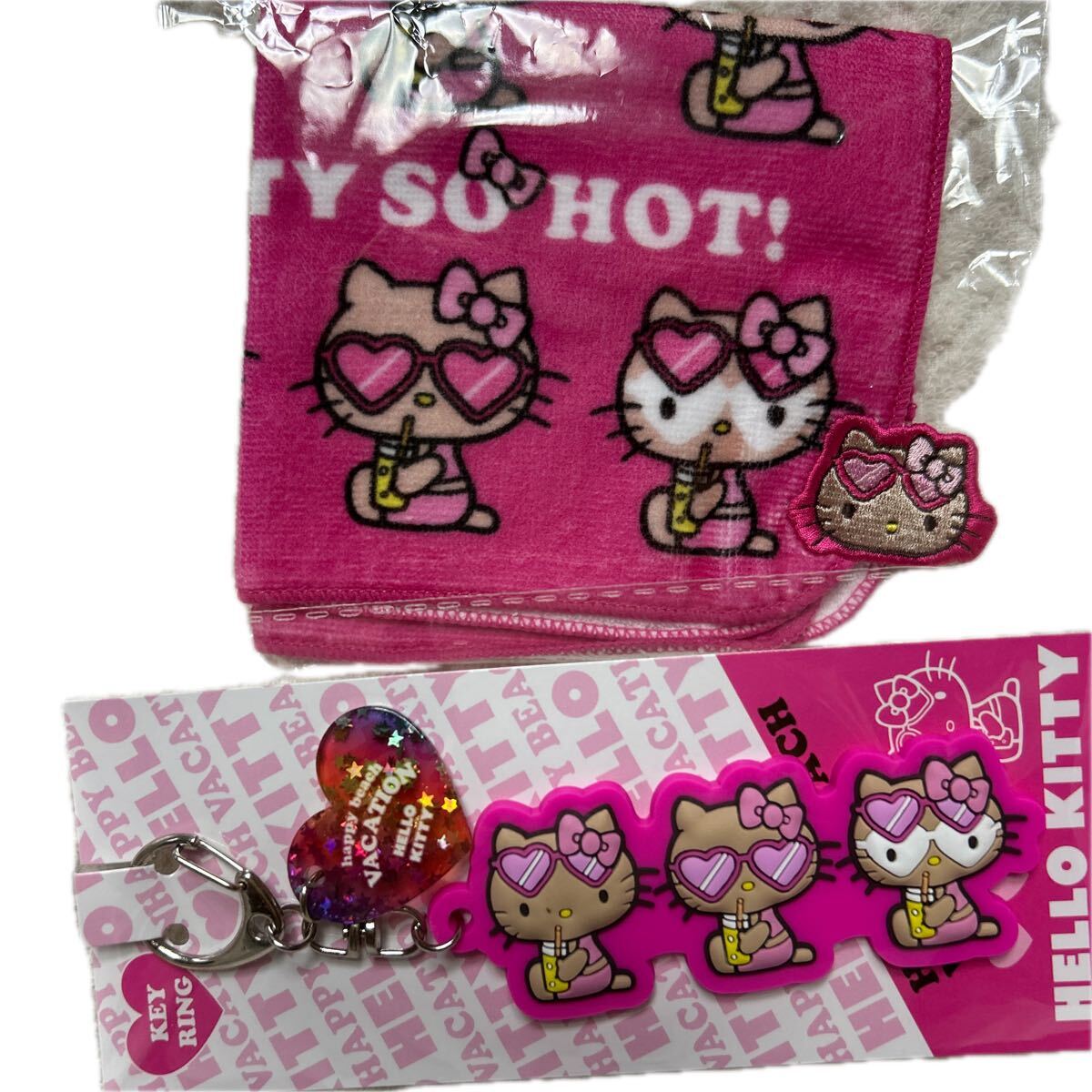 日焼けキティ ストラップ& ミニタオル拍卖