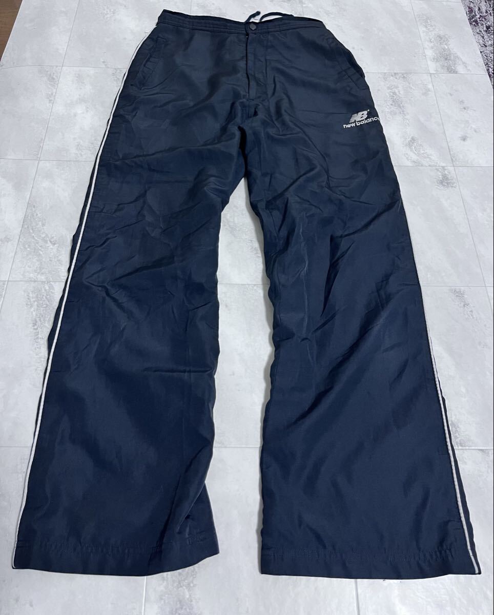 New Balance ニューバランス ナイロンパンツ 裏地起毛 Mサイズ 黒 ブラック トラックパンツ 拍卖
