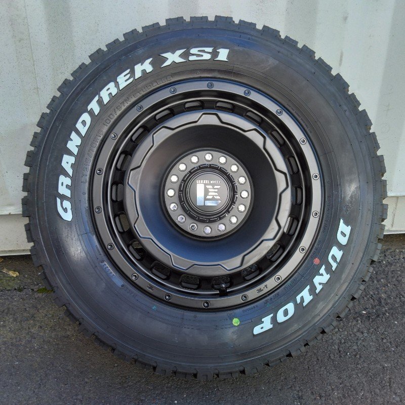 スタッドレス 新品4本セットジムニー シエラ JB74W タイヤホイール DUNLOP GRANDTREK XS1 215/70R16 16インチ LEXXEL SwaGGer拍卖