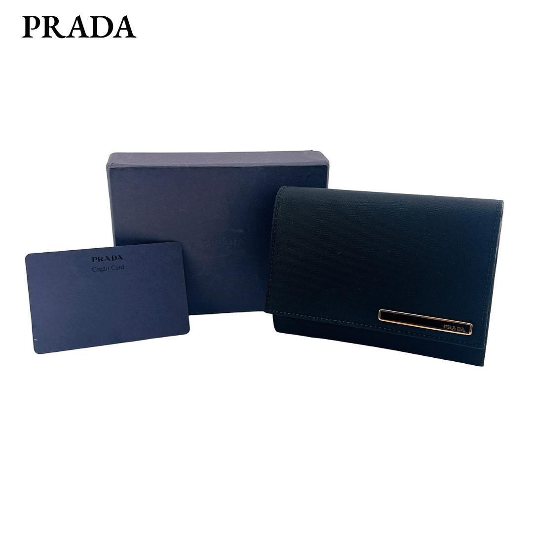 PRADA プラダ 二つ折り財布 ウォレット 財布 1M0842 ナイロン ブラック 黒 ゴールド金具 コンパクトウォレット メンズ レディース 箱付拍卖
