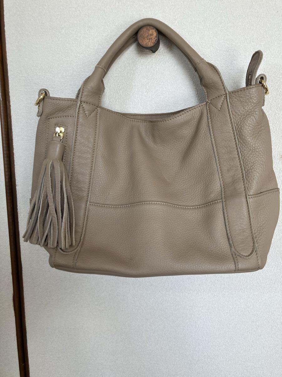 ★TREASURE TOPKAPI★レザー バッグ タッセル付き(ベージュ)拍卖