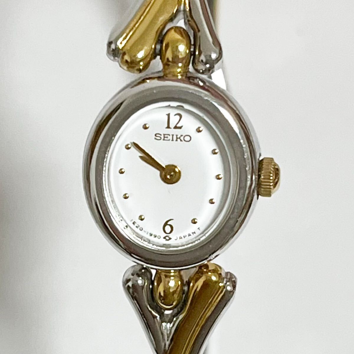 和851★ SEIKO セイコー クォーツ 腕時計 ウォッチ 2針 1E20-6130 700914 ホワイト ゴールド シルバー レディース拍卖