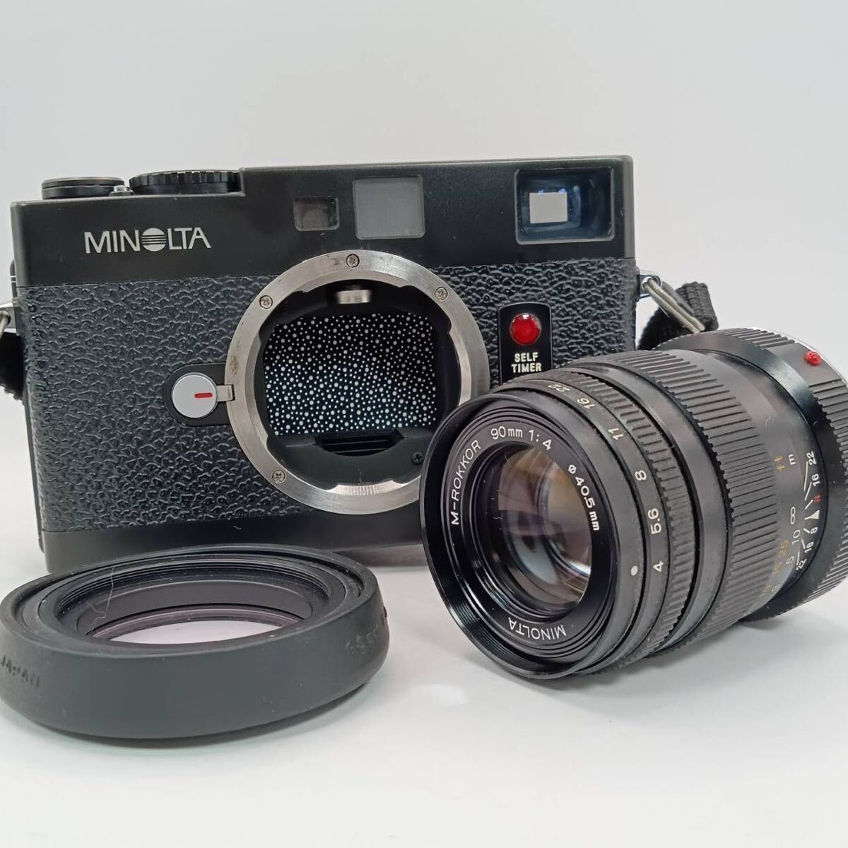 MINOLTA/ミノルタ/フィルムカメラ/ブラックボディ/CLE/ヴィンテージ/M-ROKKAR/90mm/1:4/動作未確認 レンジファインダーカメラ拍卖