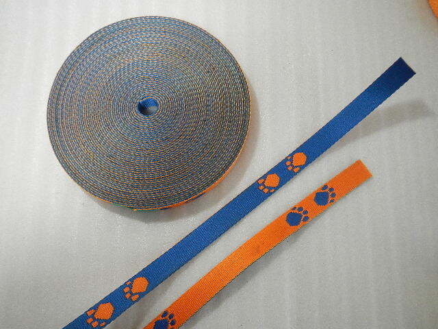 ステッチテープ 化学繊維だと思います。 幅約2cm 厚さ約2mm 長さ 15m オレンジ・青 側面汚れあります。拍卖