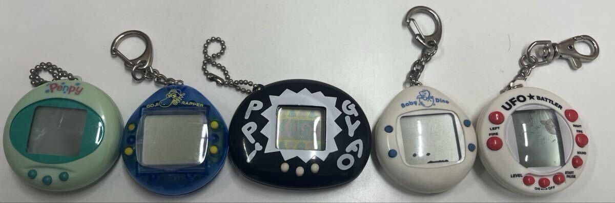 ジャンク品 携帯ゲーム たまごっち BANDAI バンダイ ぎゃおッpi BabyDino GOJIRAPPER Penpy UFO☆BATTLER キーホルダー拍卖