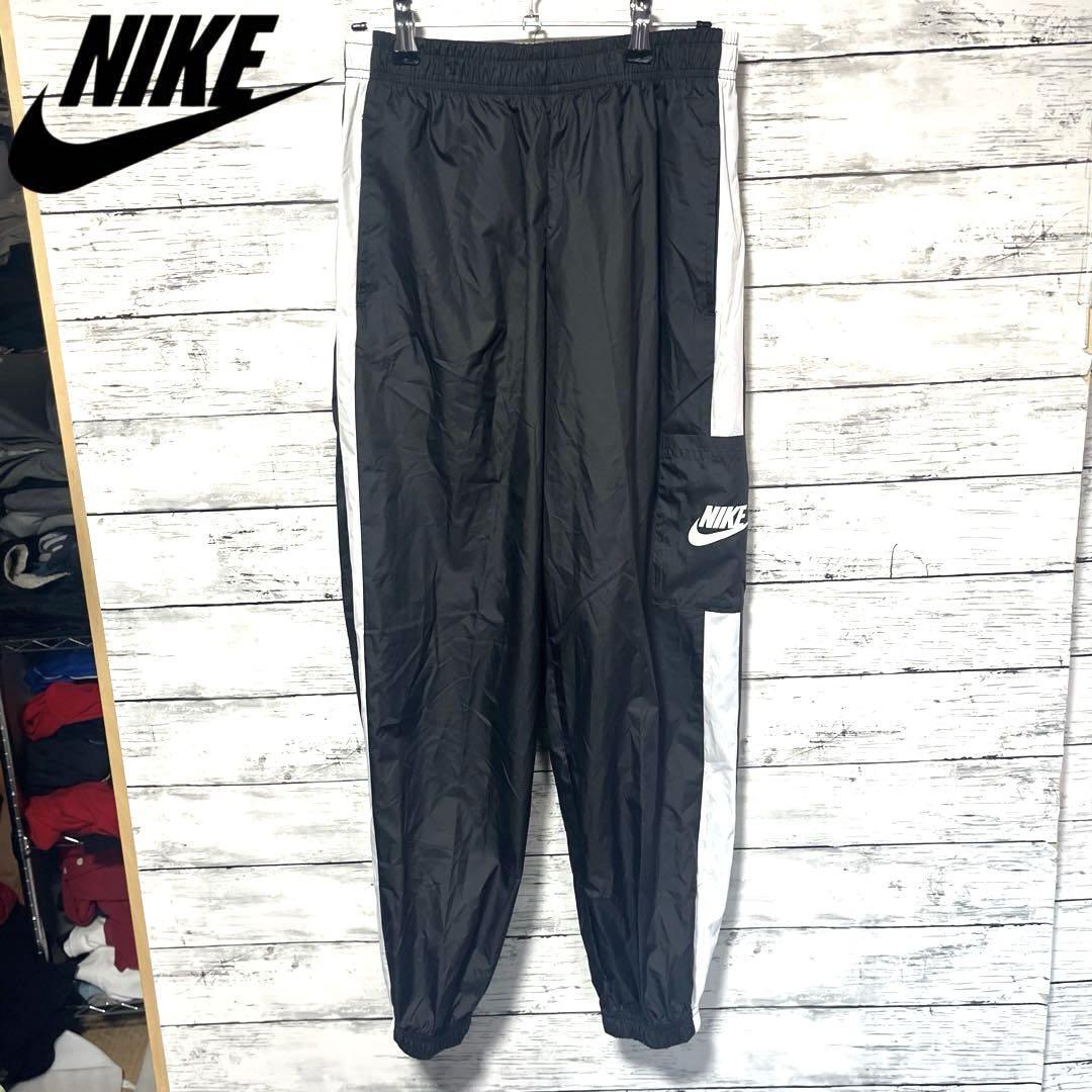 【人気デザイン】NIKE ナイロンパンツ プリントロゴ S C992拍卖