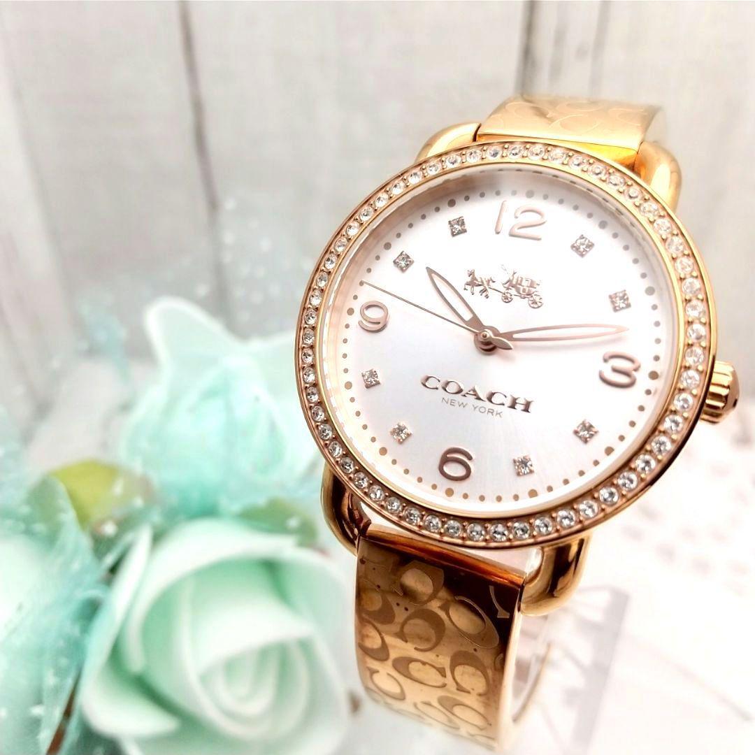 稼働品 美品 コーチ バングル腕時計 レディース ストーン付き 馬車ロゴ拍卖