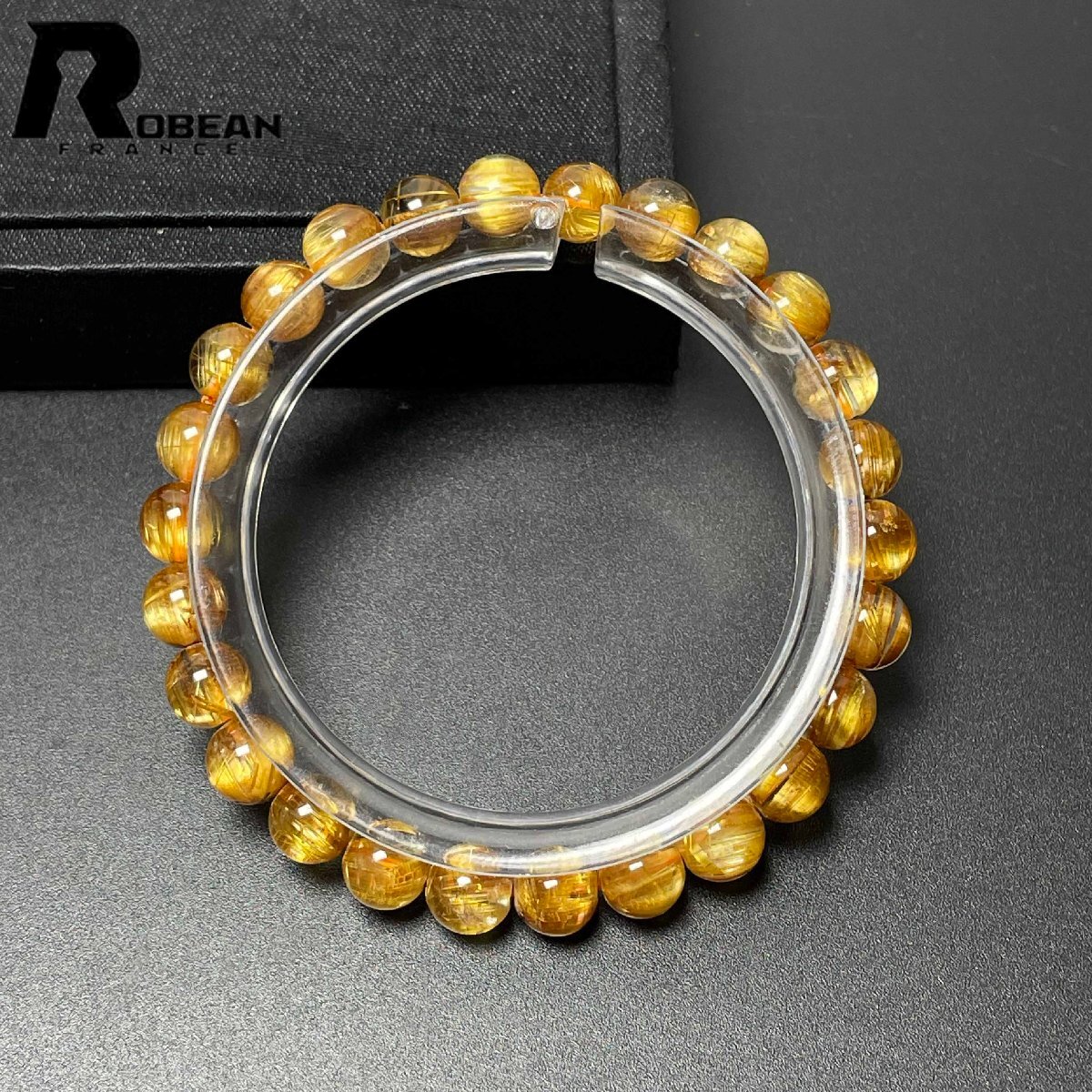 貴重 EU製 定価98万円★ROBEAN・極!極満針ルチルクォーツ★猫目 ブレスレット パワーストーン 天然石 金運 お守り 6.8-7.2mm D0507609拍卖