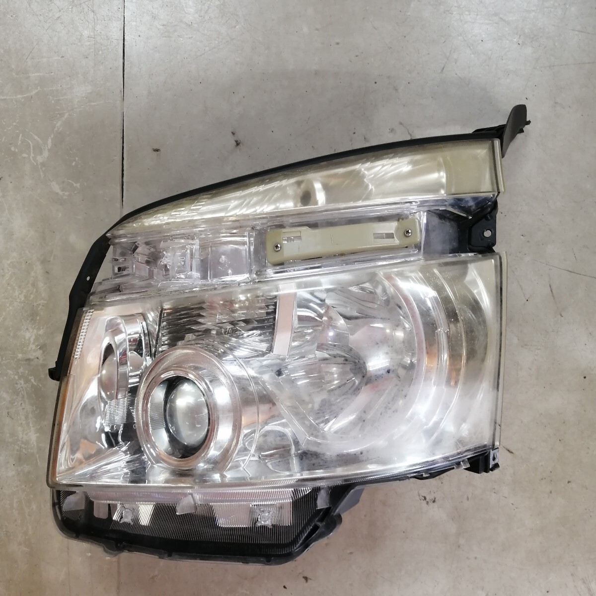 トヨタ ZRR70G ヴォクシー 左ヘッドライト 15738 0073 H21年式拍卖