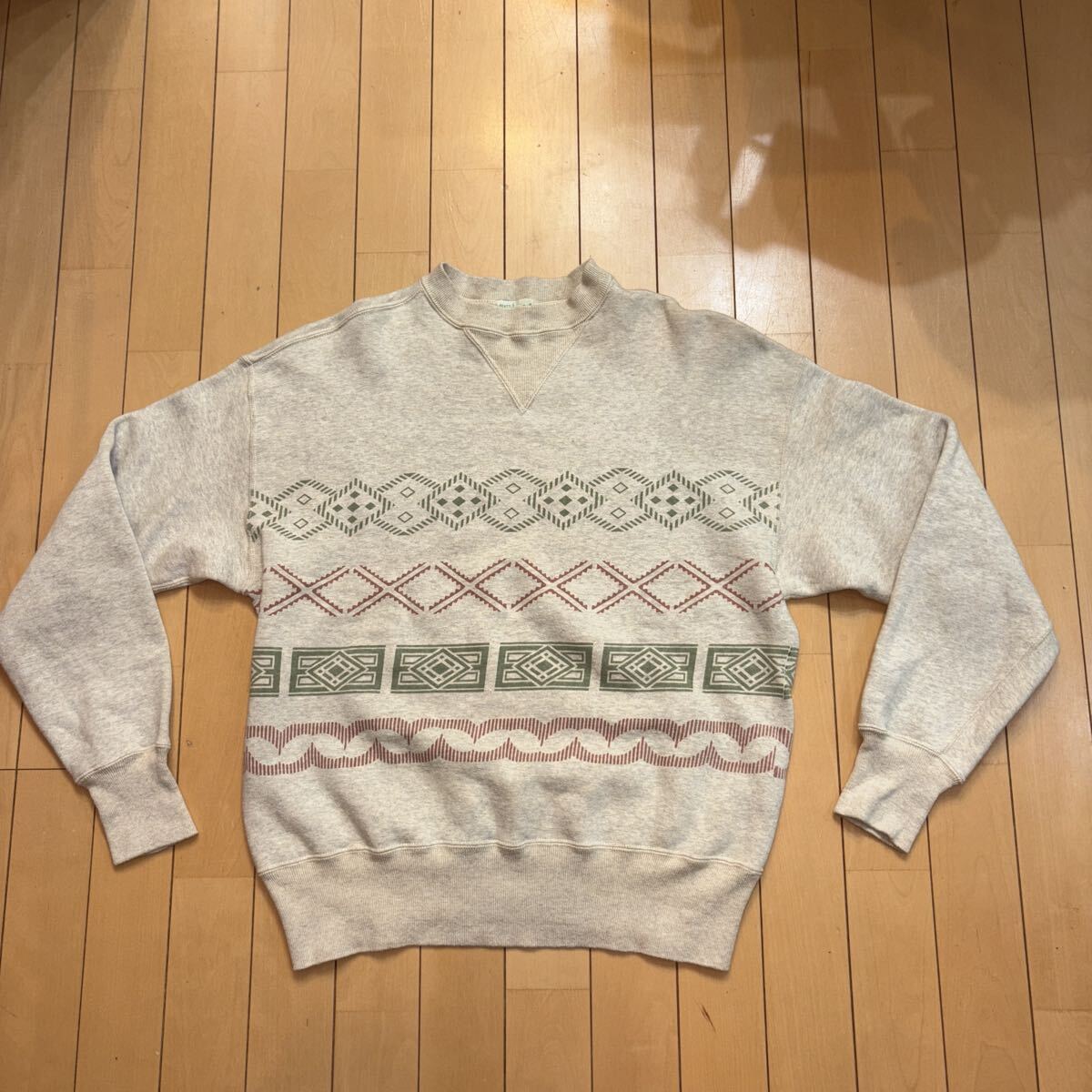 美品 Heller’s cafe ヘラーズカフェ ネイティブ柄プリントスウェット拍卖