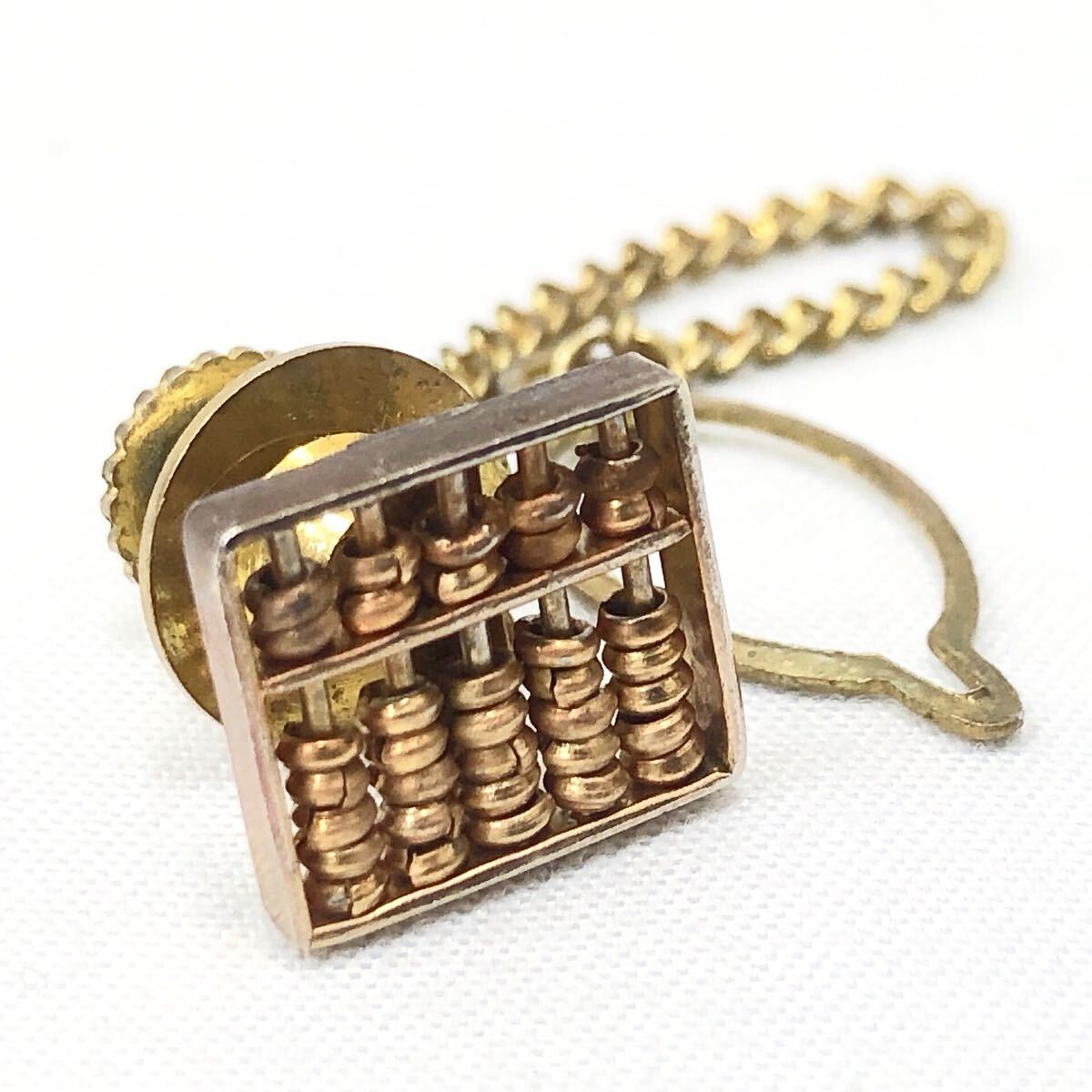 ★2-1007 18K刻印 重量2.5g タイタック アクセサリー そろばんデザイン ゴールド 未検品拍卖