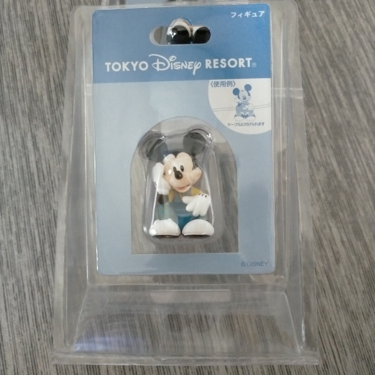 Tokyo Disney 頬杖をつくミッキーデザイン!東京ディズニーランド フィギュア(ケーブルホルダー) 東京ディズニーリゾート ミッキーマウス拍卖