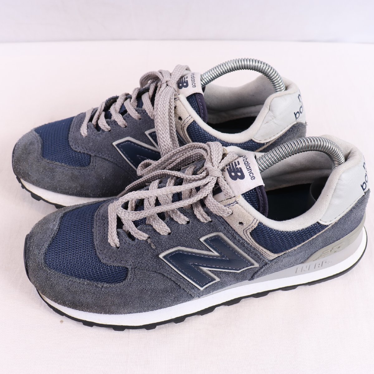 574 ニューバランス 25.0cm/new balance 紺 ネイビー 灰 グレー 中古 古着 メンズ スニーカー yy7082拍卖