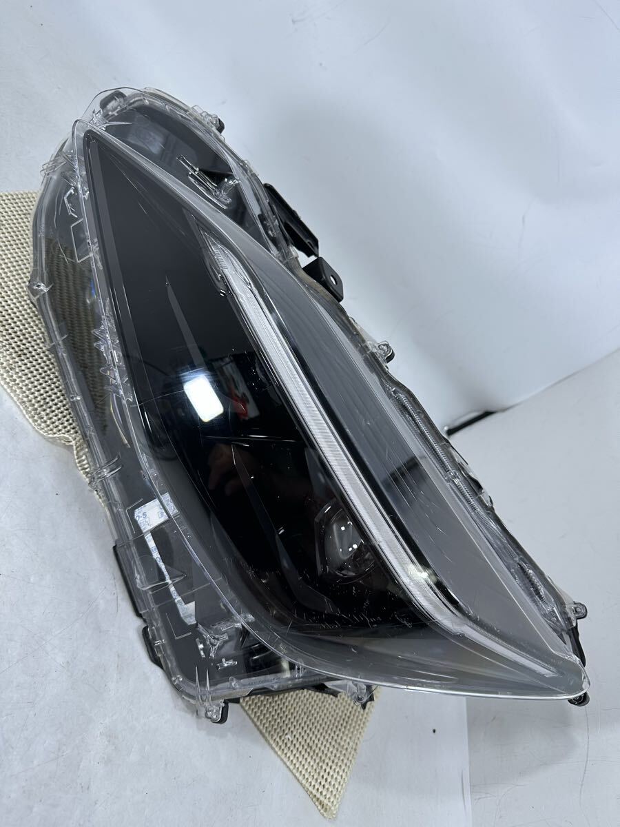 M49-2-3 カローラクロス  左 MXPB10 MXPJ10 打刻B2 52-325 ヘッドライト拍卖