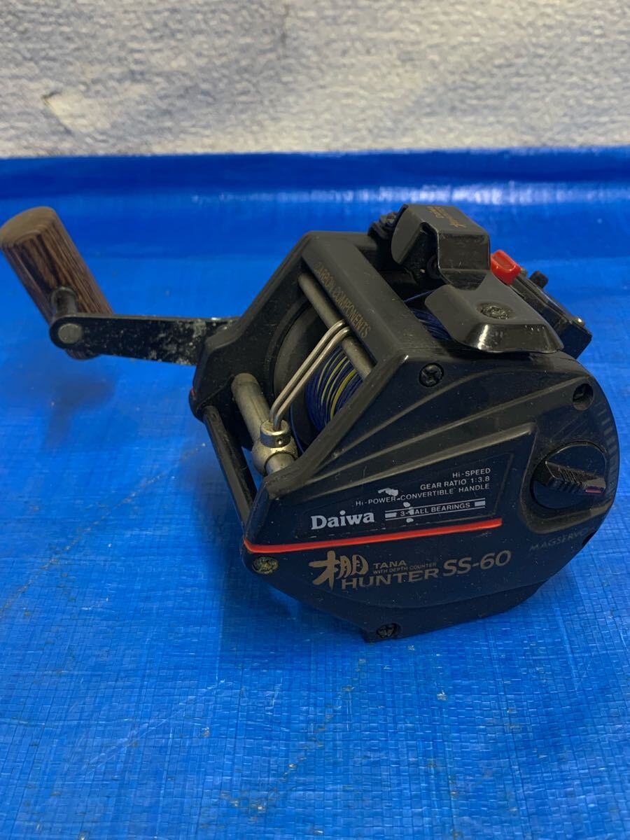 1081.60. Daiwa ダイワ TANA HUNTER SS-60 船用 軸 リール 棚ハンター 中古現状品拍卖