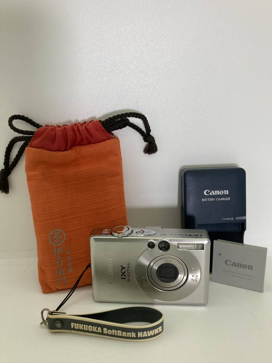 Canon IXY キャノン DIGITAL 60 PC1158/2118608895 シルバー デジタルカメラ 動作未確認 現状品 オレンジ巾着付き 充電器付き拍卖