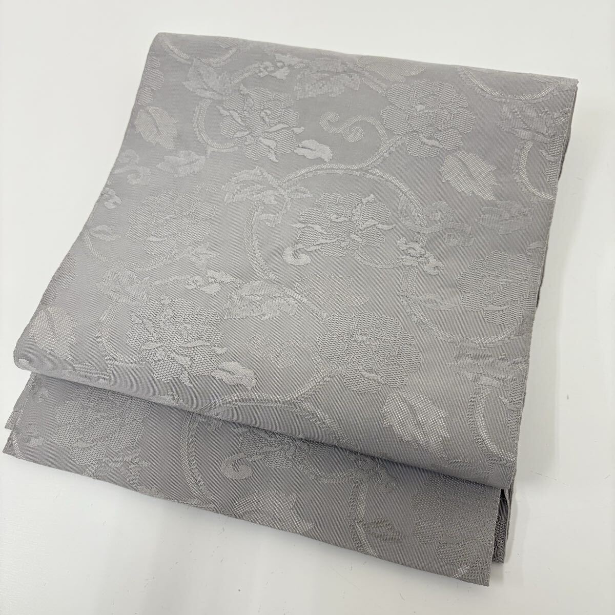 名古屋帯 正絹 綴れの花唐草 無地出し 八寸 F-837拍卖