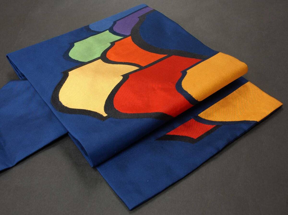 ☆名古屋帯☆紺地 カラフルな幾何学な柄 正絹 お太鼓柄☆拍卖