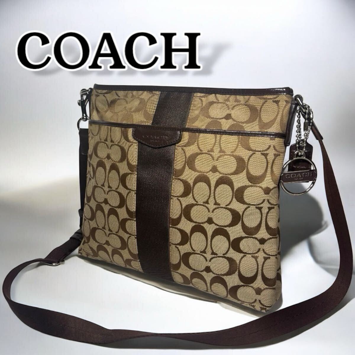 COACH コーチ レディース メンズ ショルダーバッグ シグネチャー キャンバス ブラウン 肩掛け 斜め掛け クロスボディ リングロゴチャーム拍卖