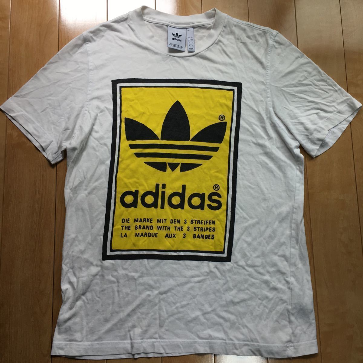 adidas ビッグトレフォロイルロゴ イエロー×ホワイト×ブラック アディダス Tee 半袖拍卖