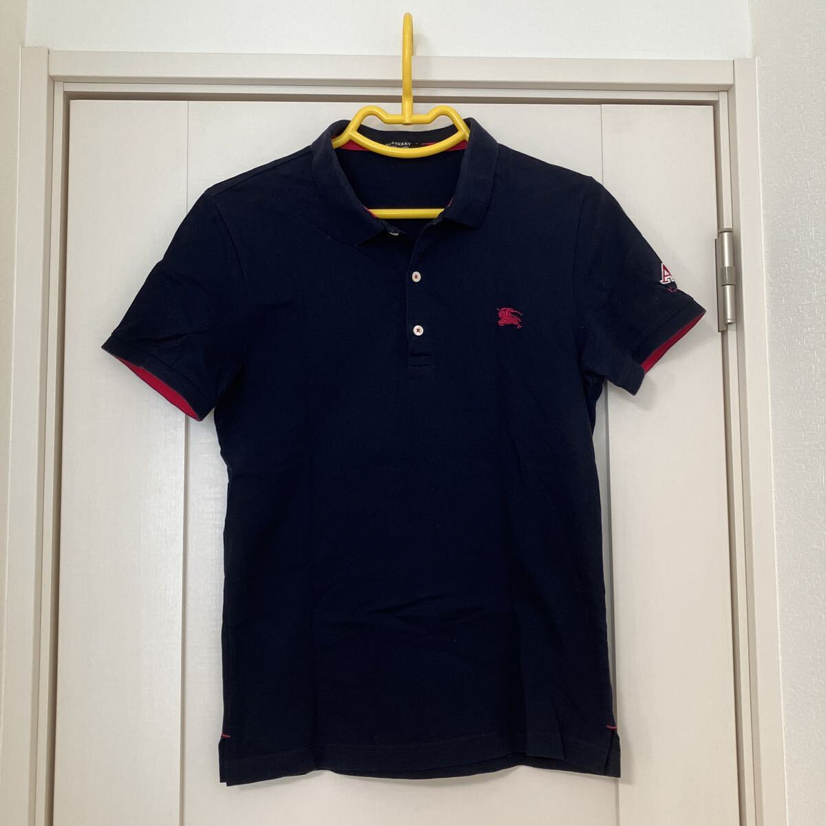 バーバリーブラックレーベル ポロシャツ ネイビー拍卖