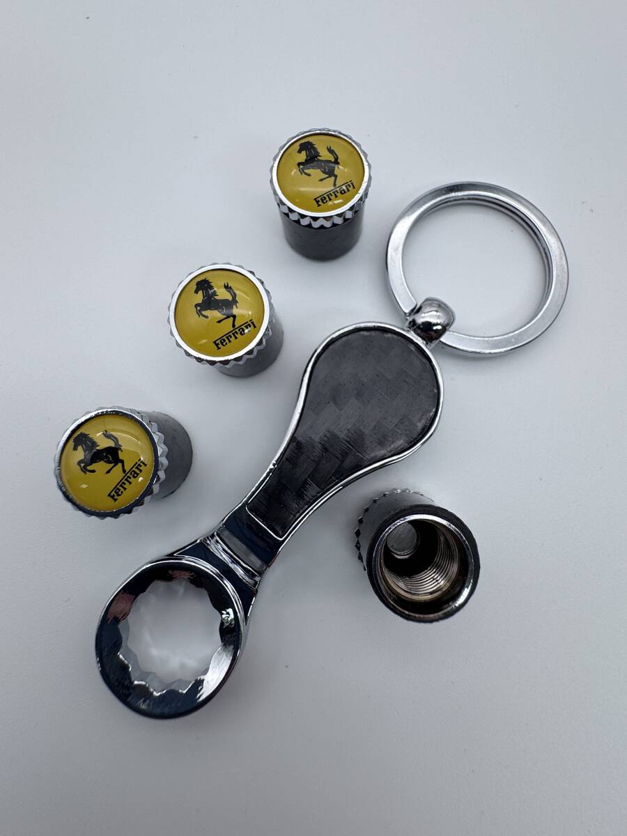 ゆうパケット送料込み フェラーリ リアルカーボンエアバルブキャップ1台分 4個セット ロゴ付き 盗難防止バルブ二重構造拍卖