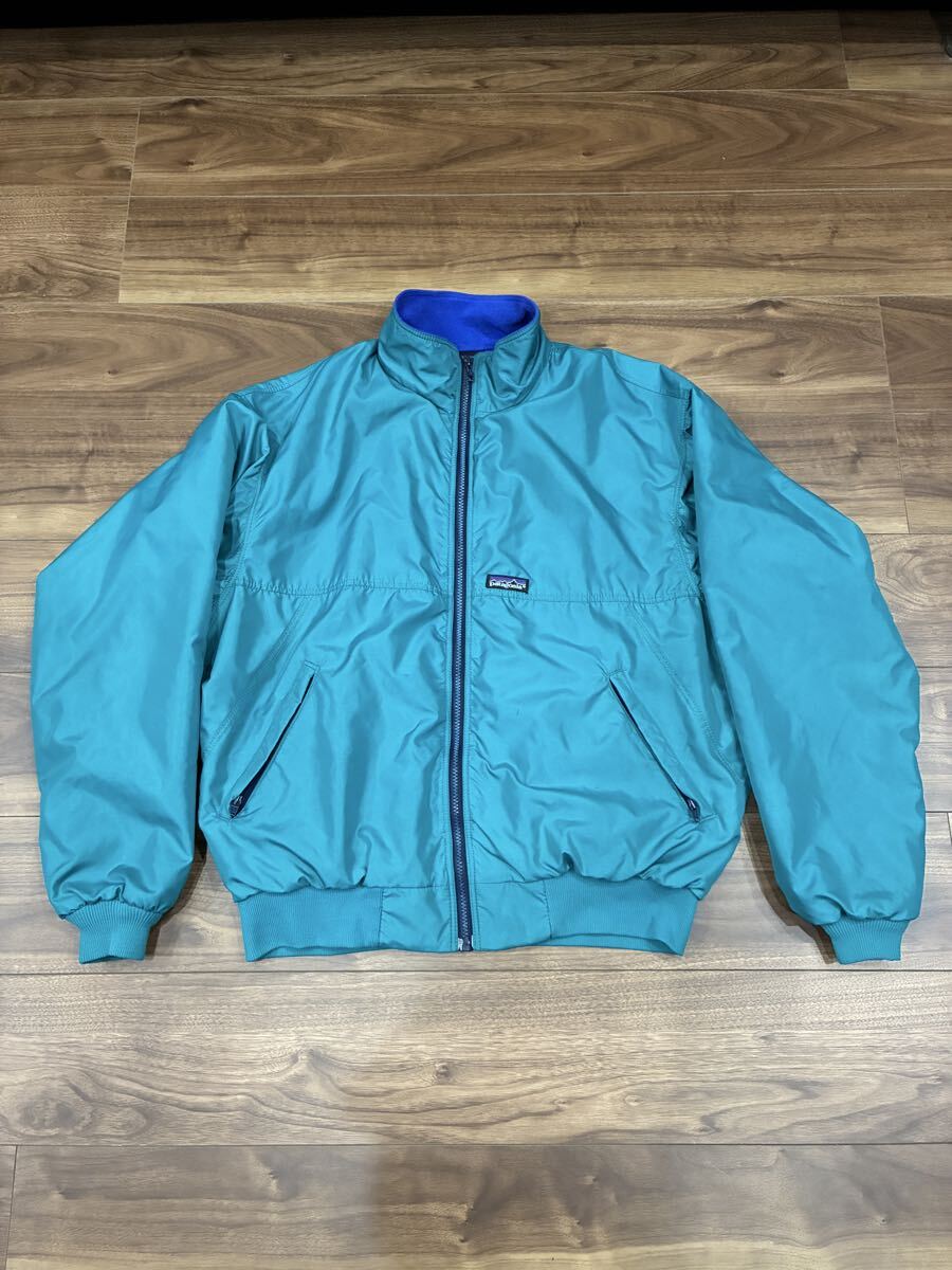 ★USA製90s パタゴニア シェルドキャプリーン ナイロンジャケット Lサイズ★ターコイズ シェルドシンチラ 80sデカタグ スナップTグリゼード拍卖