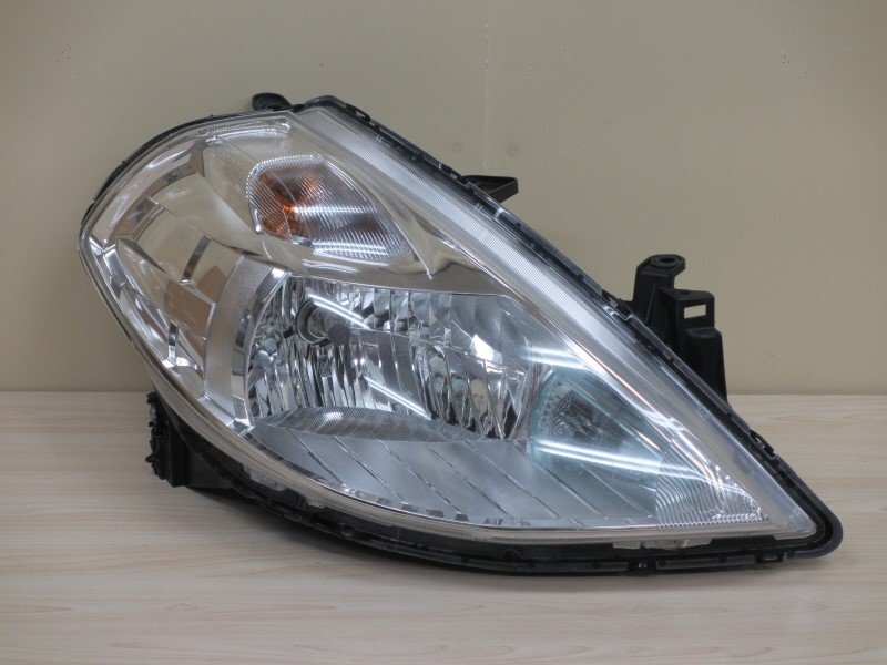 ティーダラティオ SC11 右側ヘッドライト 運転席側ヘッドライト (ym25-193-41)拍卖