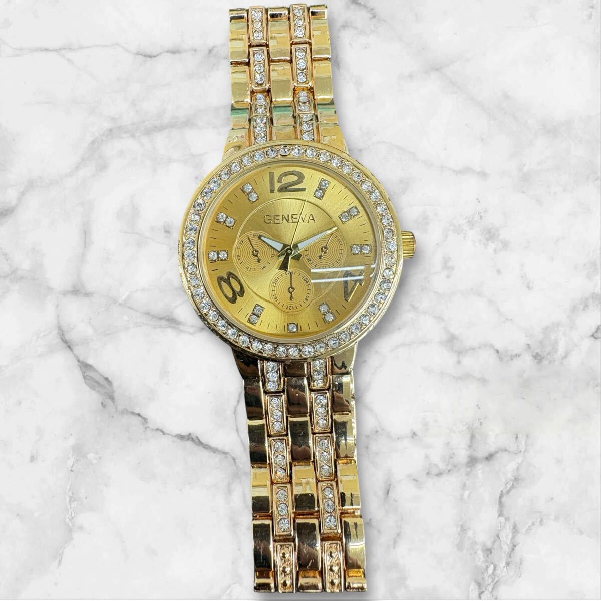 ◯a GENEVA 腕時計 ゴールドカラー 動作未確認 時計 ゴールド 石 メンズ 拍卖