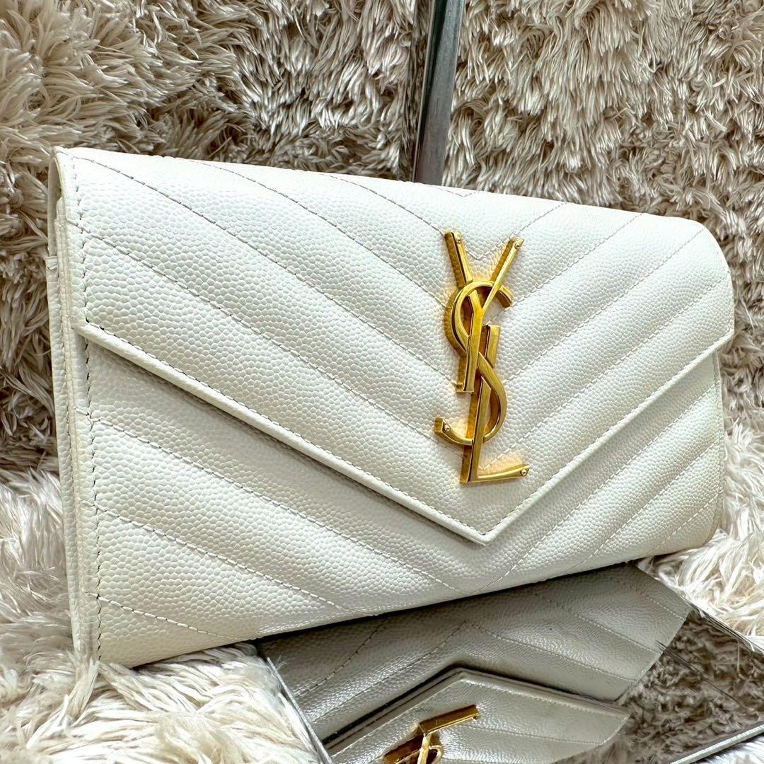 【未使用級】Yves Saint Laurent イヴサンローラン 長財布 フラップ ホワイト Vステッチ キャビアスキン YSL ゴールドロゴ レディース拍卖