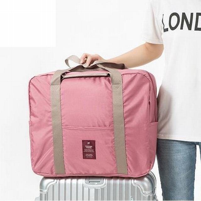 ボストンバッグ トラベルバッグ キャリーオンバッグ 収納可能 折りたたみ収納 旅行 大容量収納可能 2way 手持ち 肩掛け ピンク拍卖