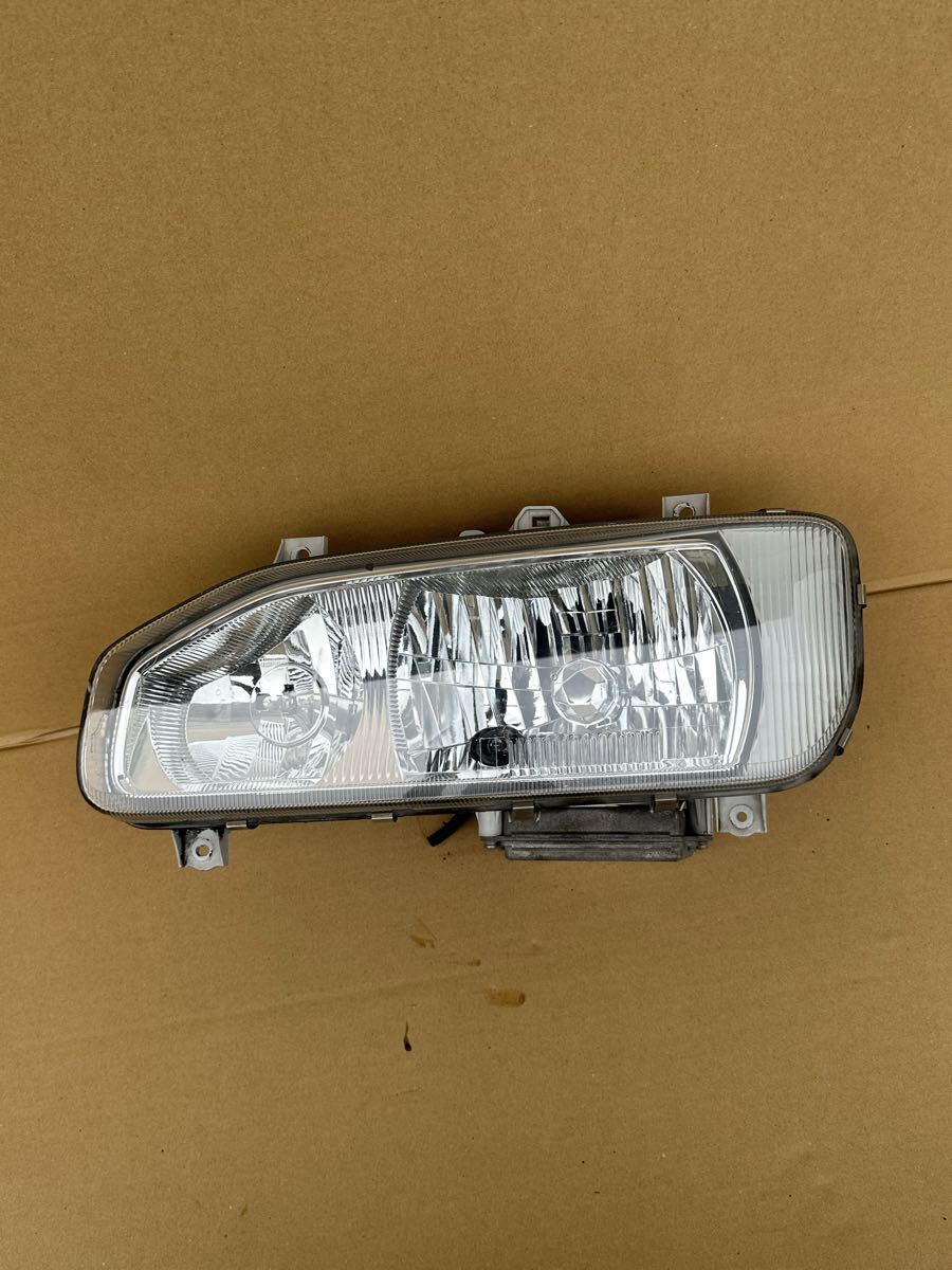 B248 日産 UD トラックス クオン ヘッドライト ランプ 左 左側 助手席側 W3T10973 39000-25759 KOITO 100-25740 点灯確認済拍卖
