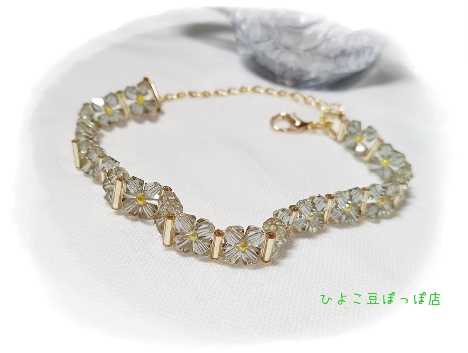 235:金露の花綴り スワロフスキーのゴールドブレスレット 16+5cm拍卖