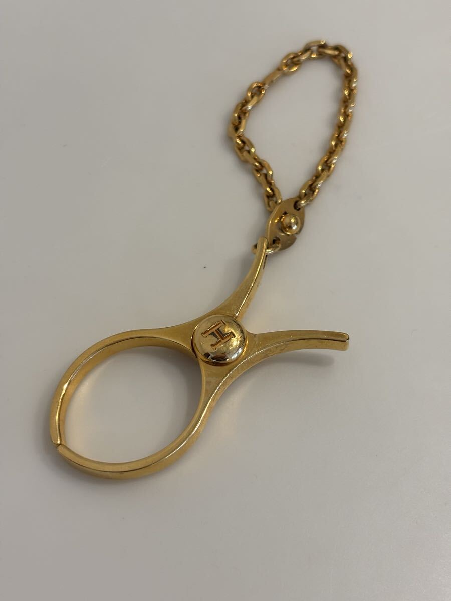 エルメス HERMES グローブホルダー ゴールドカラー 手袋ホルダー ゴールド系 フィルー拍卖