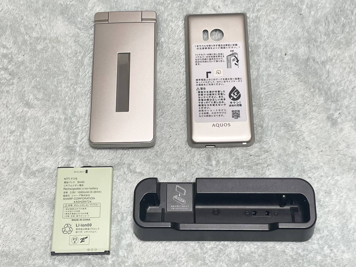 【匿名送料無料】美品即決【卓上台SH50付】SHARP製 ドコモ 防水ワンセグ AQUOSケータイ SH-02L ゴールド★SIMフリー/Wi-Fi対応拍卖