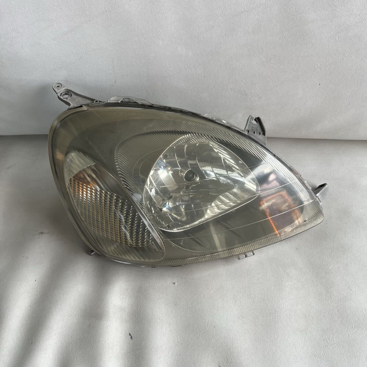 ヴィッツ TA-NCP10 右 ヘッドライト ヘッドランプ ASSY 52-001拍卖