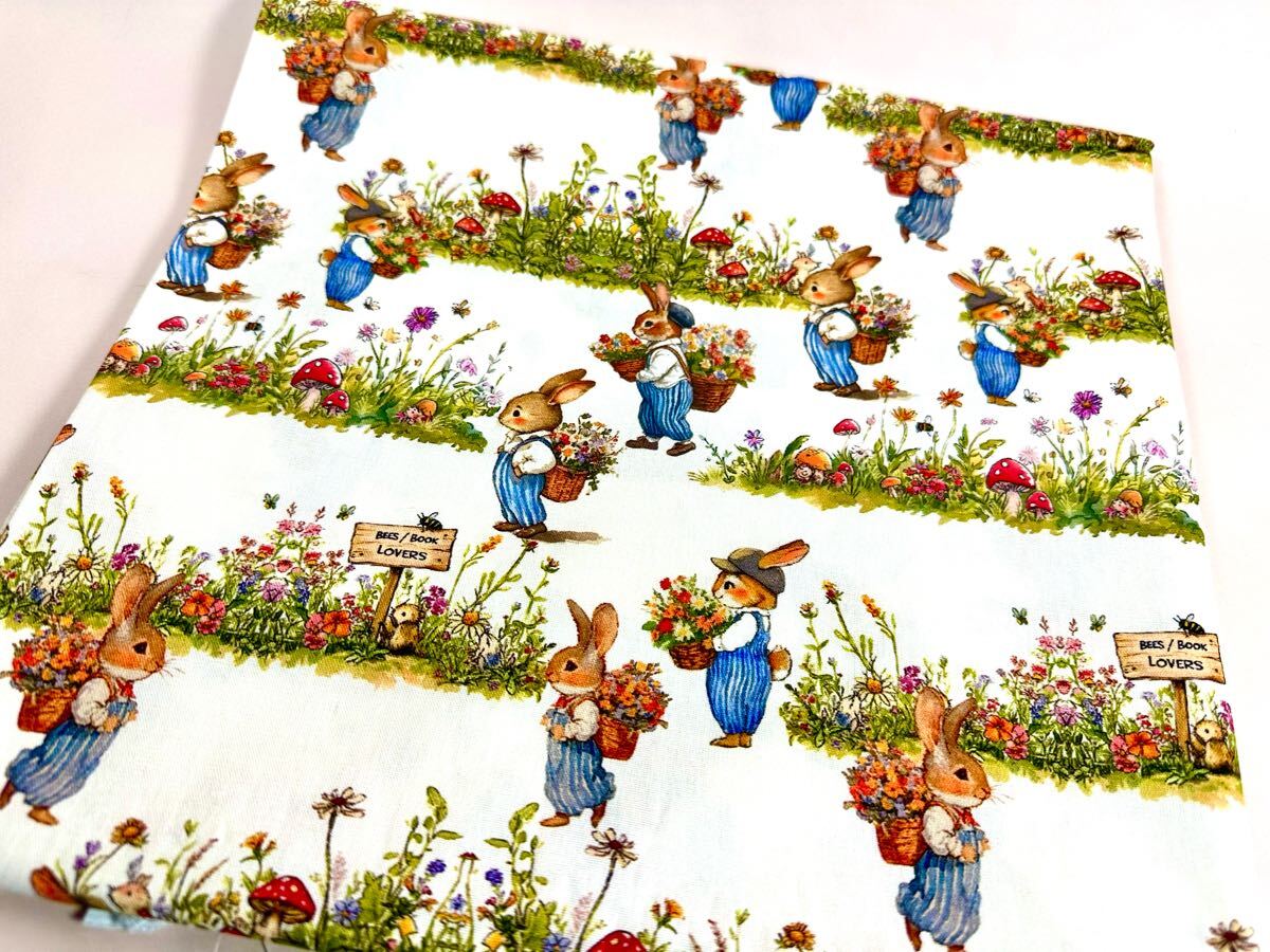 USAシーチング綿100%.生地幅110cm×50cm.薄い黄色地.兎.4772拍卖