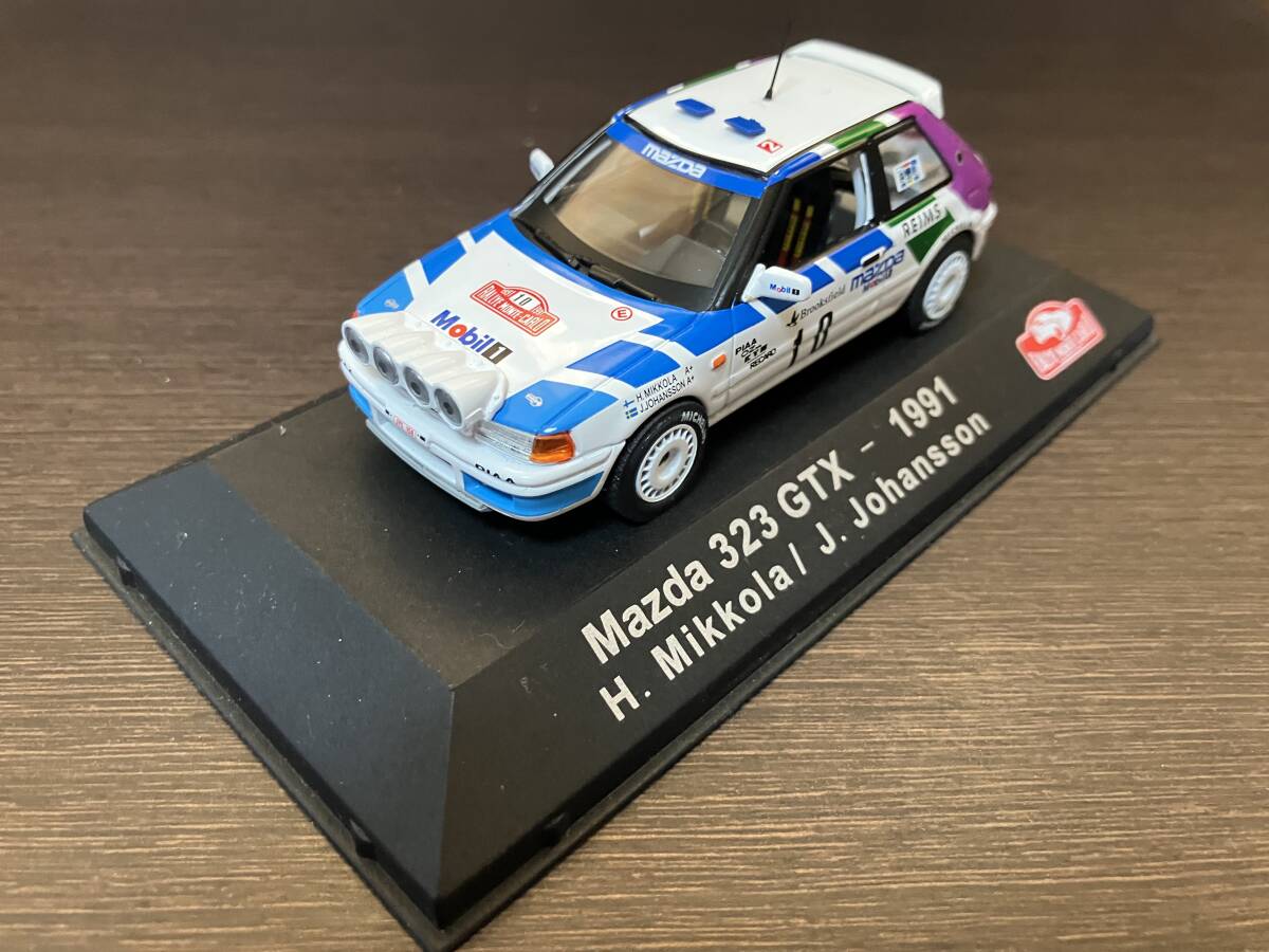 1/43 RALLY CAR COLLECTION 【ライトポッド仕様】 マツダ・323 GT-X #9 H.ミッコラ組 ラリー・モンテカルロ 1991拍卖
