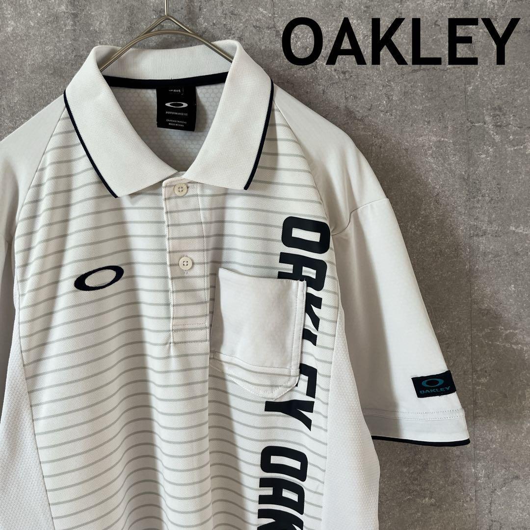 OAKLEY ボーダーポロシャツ 白 ストレッチドライ速乾 メンズMサイズ拍卖