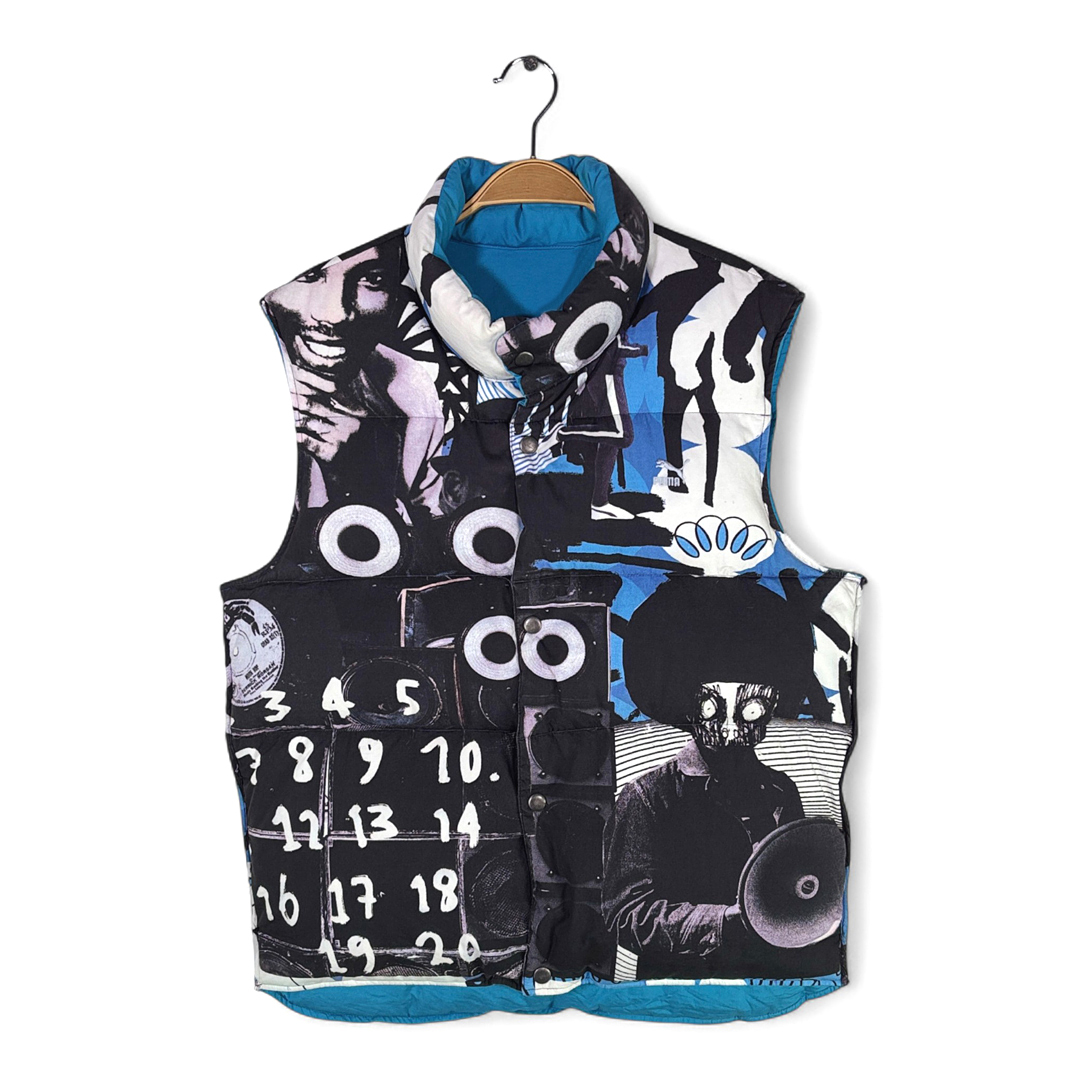 【送料無料】プーマ ダウンベスト リバーシブル グラフィックプリント ナイロン マッカーサー 宇宙パイロット 総柄 PUMA M相当 @CJ9009拍卖