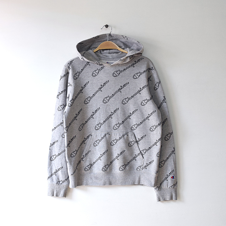 チャンピオン スウェットパーカ チャンピオンロゴ 総柄 灰色 レディースL相当 トレーナー スウェット Champion 古着 CG0079拍卖