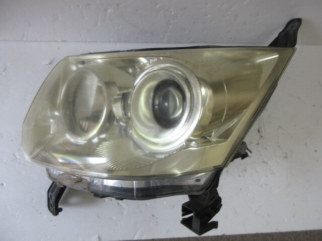 送料無料★ ダイハツ ムーヴカスタム L185S 左 コイト 100-51990 HID ヘッドライト 管番1025拍卖