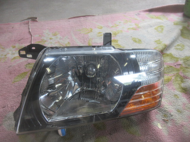 ★R7A9363 V63W パジェロ 純正左ヘッドライト コイト100-87419 修理やストック等に拍卖