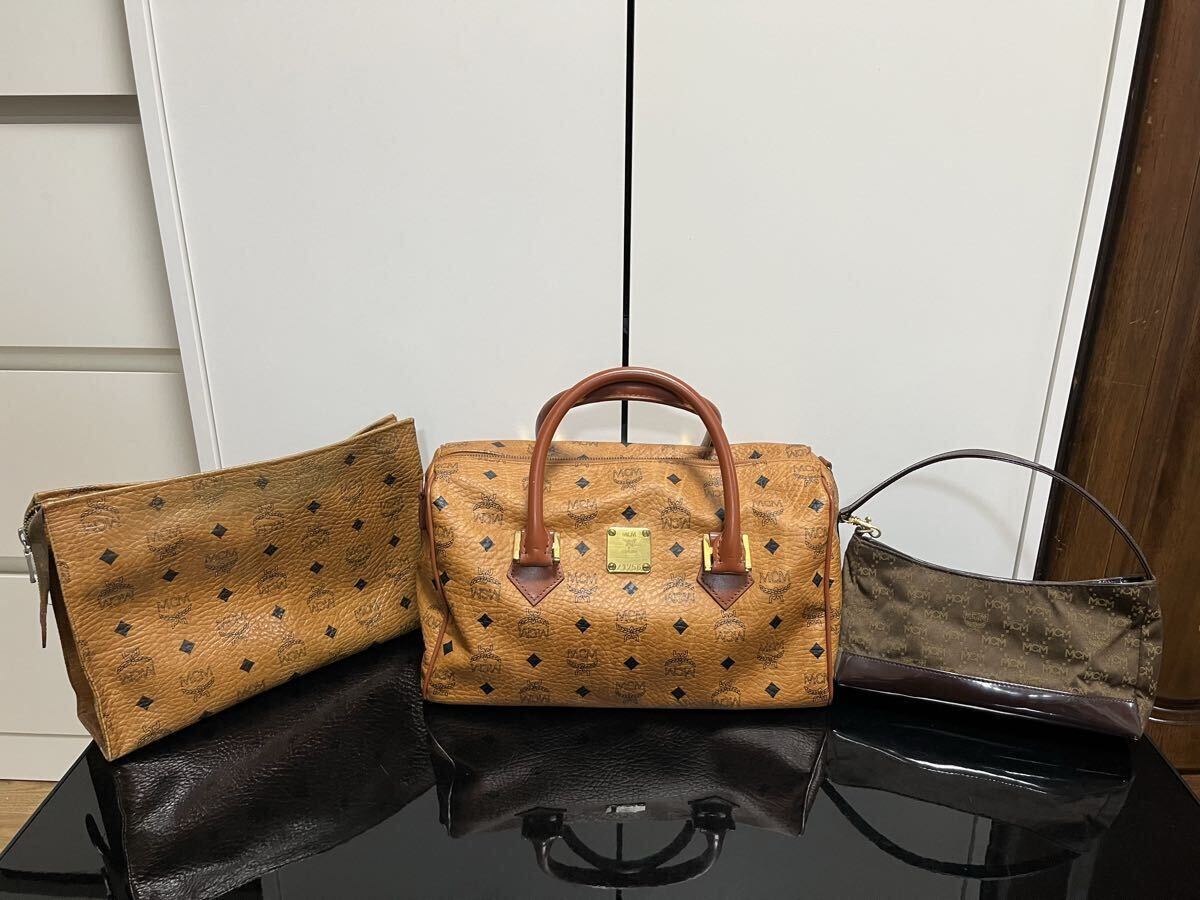 MCMエムシーエムカバン3点セット ハンドバック ショルダーバック クラッチバック ブラウン系 掘り出し物拍卖