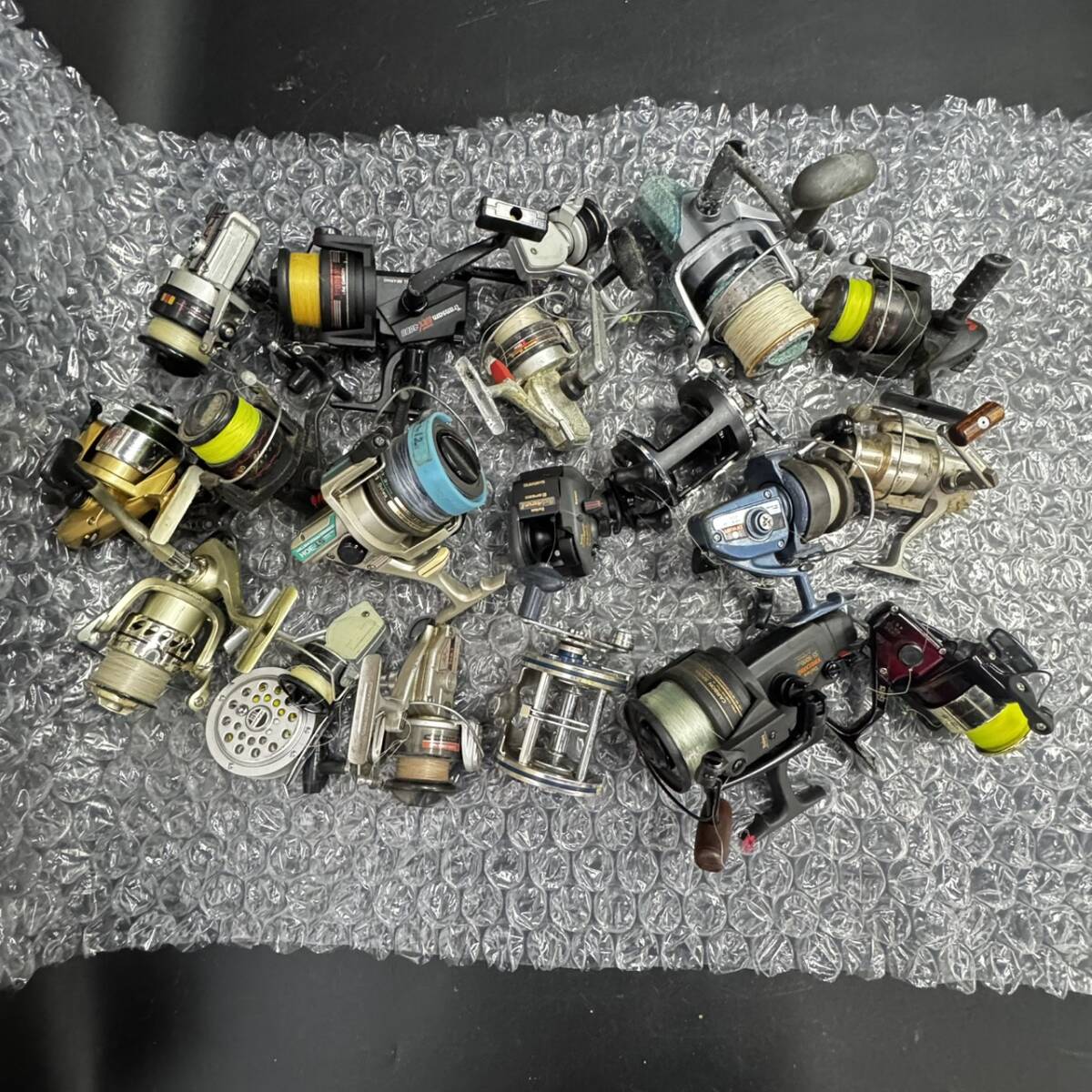 z/z/z/U113-17/8400/ リール20個まとめ 約8.4kg Daiwa ダイワ OLYMPIC TRANSAM 他 状態様々拍卖